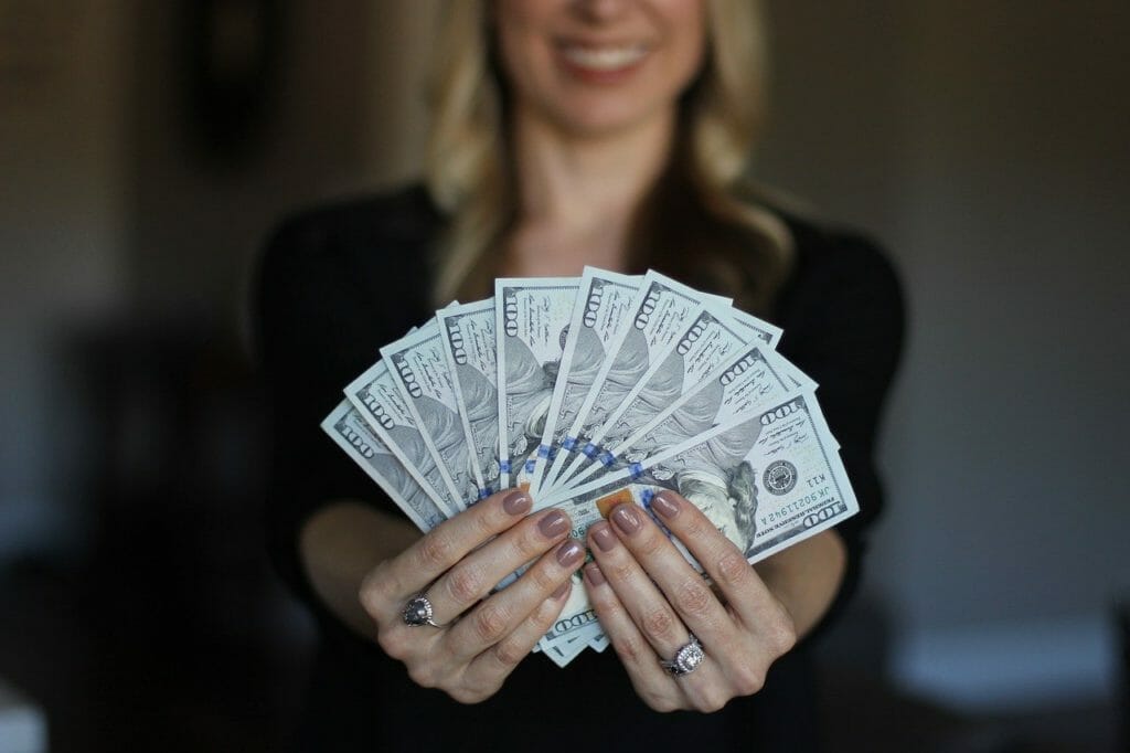 Woman fanning money