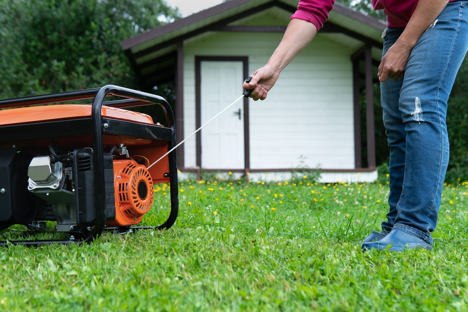 Woman starts a large portable generator